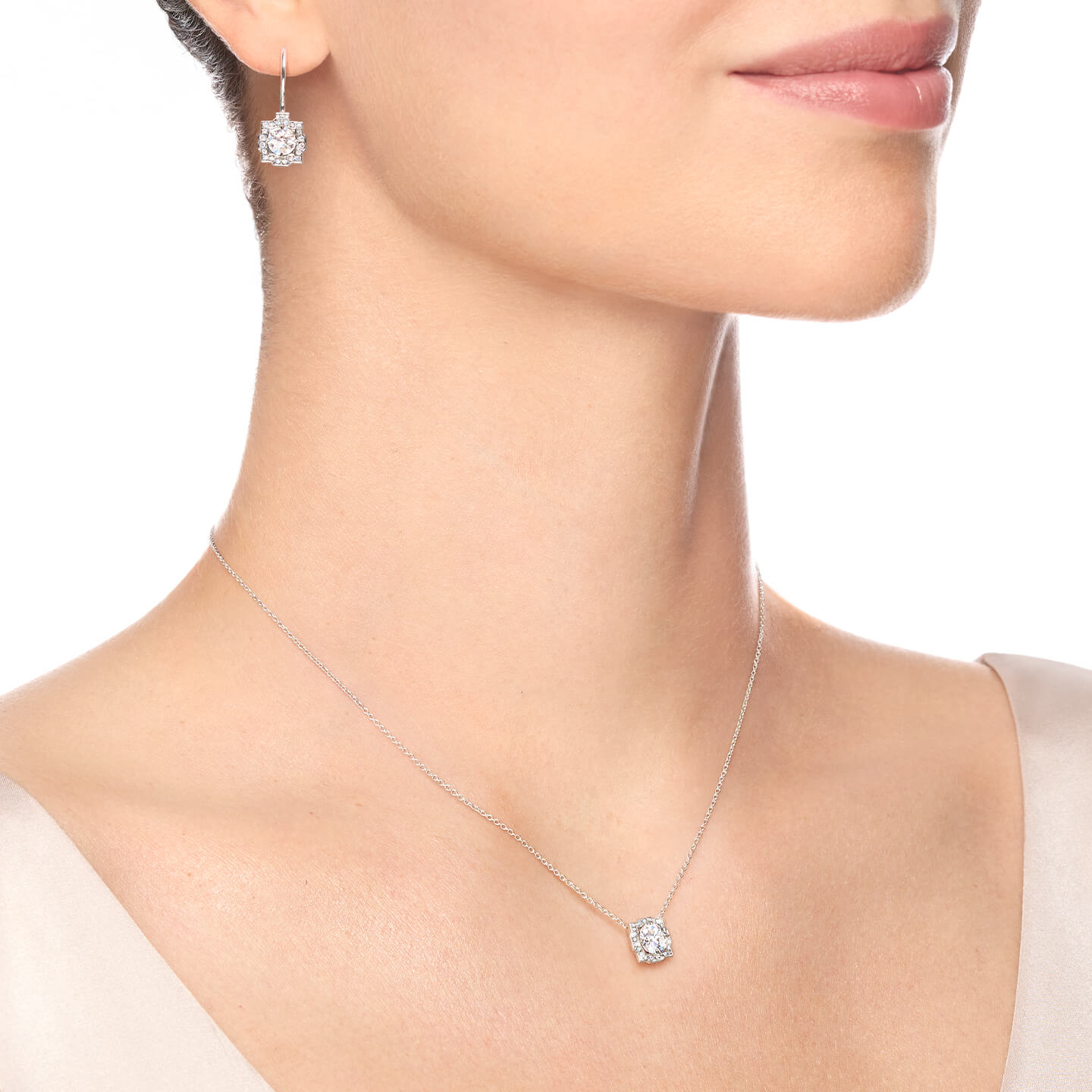 Belle Round Brilliant Diamond Micropave Pendant on a model angled