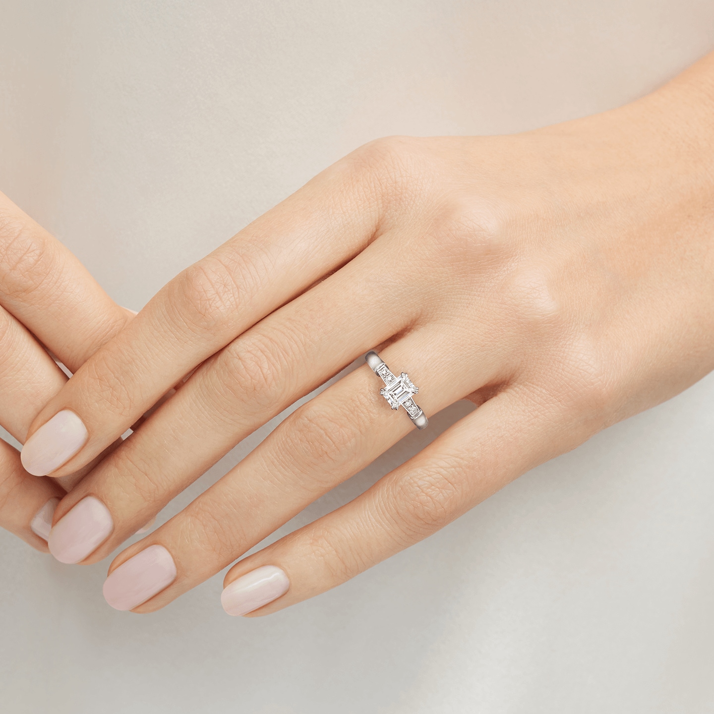 Tryst Emerald-Cut Diamond Engagement Ring featured on model