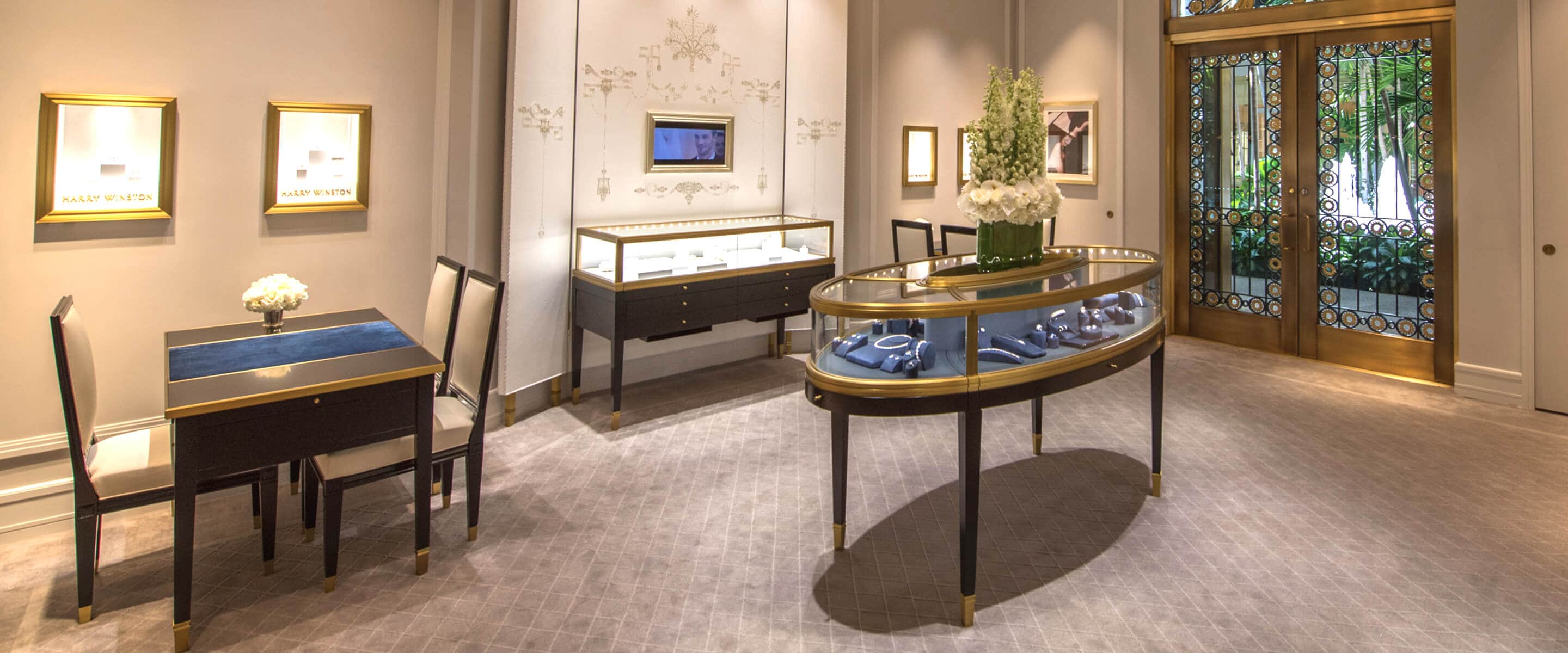 Luxury showroom featuring jewelry display case of the Harry Winston Bal Harbour Salon