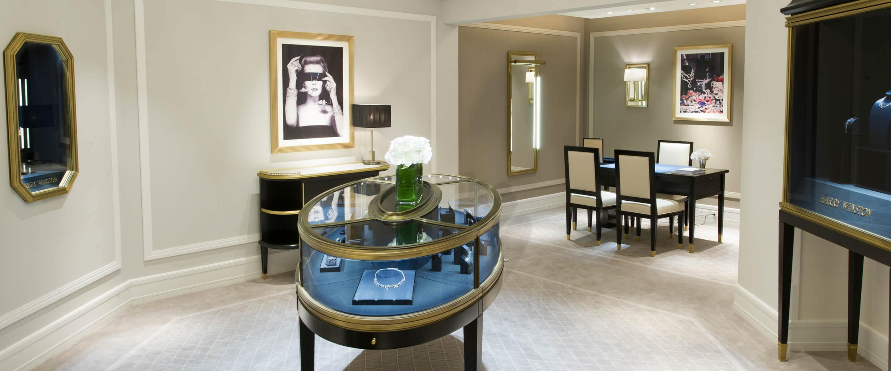Luxury showroom featuring jewelry display case of the Harry Winston Miami Design District Salon